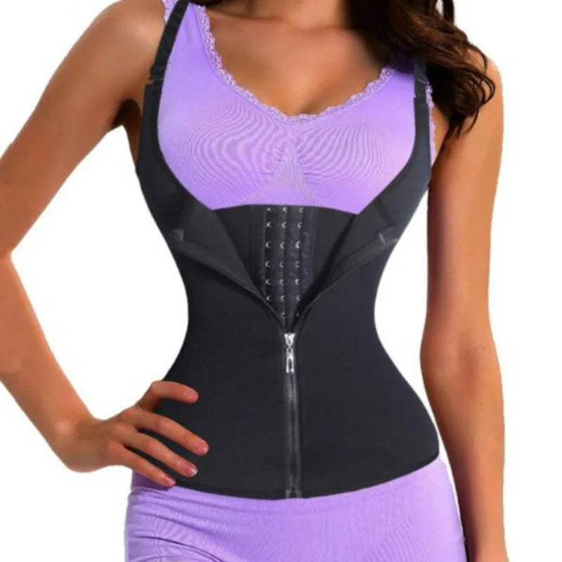 Woman wearing a black waist trainer over a purple top and pants on a white background
