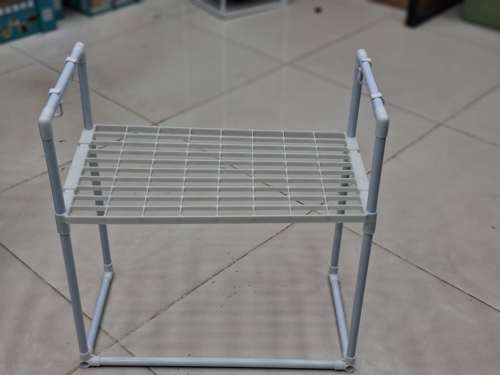 Close up of the durable carbon steel frame on the kitchen storage shelf
