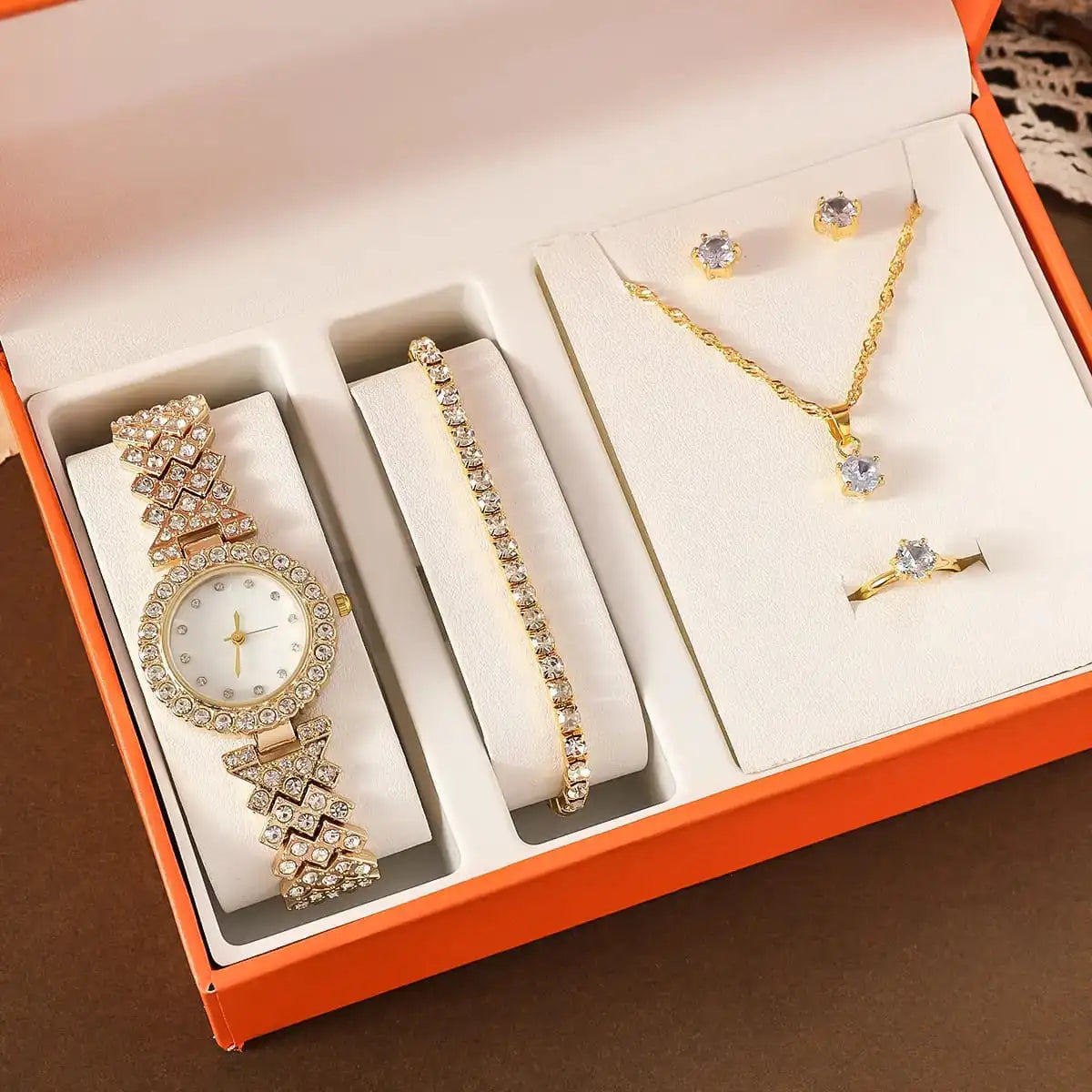 4 piece women watch and jewelry set price in Pakistan inside luxury gift box.