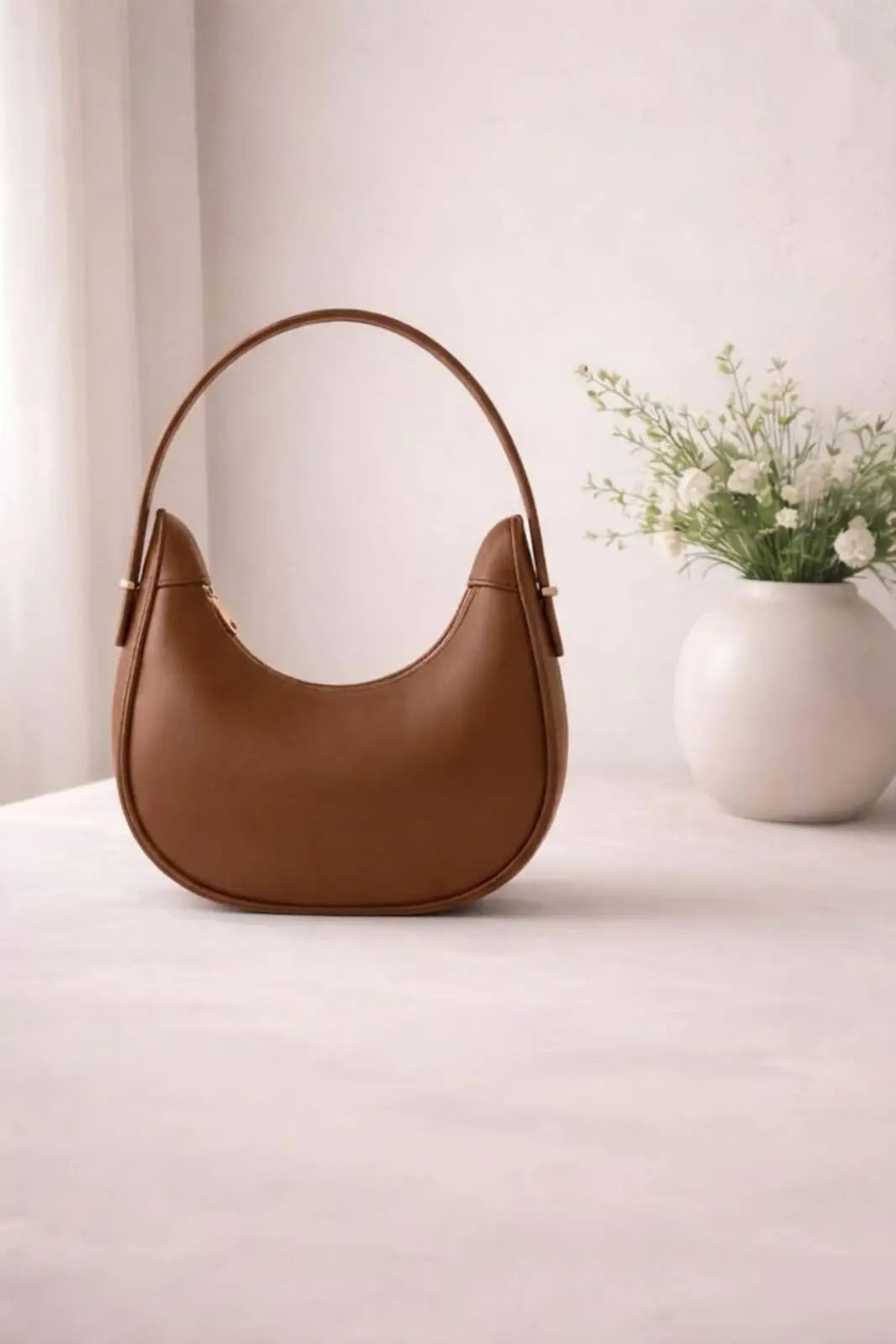 Minimalist bag for girls styled with traditional Pakistani Kurti.